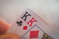 Two cards two kings, Playing cards in hand on the table, poker nands Royalty Free Stock Photo