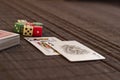 Two cards near deck with dices Royalty Free Stock Photo