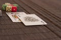 Two cards near deck with dices Royalty Free Stock Photo