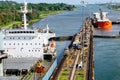 Two cargo ship transiting the Miraflores locks in the Panama Canal Royalty Free Stock Photo