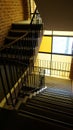 Two carpeted passageways as part of the stairs in a modern residential building.