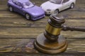 Two cars collided, an accident and a hammer of the judge.