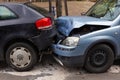 Two cars with metal damage after a rear-end collision Royalty Free Stock Photo