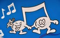 Two cartoon characters singing and dancing representing music notes Royalty Free Stock Photo
