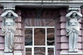 Two caryatids adorn an old house in Kyiv Ukraine