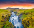 Two cascade waterfall on Skoga river. Amazing summer view from the tourist trek from famous Skogafoss waterfall