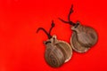 Two castanets are on a red background Royalty Free Stock Photo