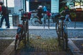 Two casual city bikes locked on a bike stand