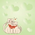 Two cats cuddling tied together with bow and hearts in the background display love and harmony among lovers. Heart Royalty Free Stock Photo