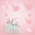 Two cats cuddling tied together with bow and hearts in the background display love and harmony among lovers. Heart Royalty Free Stock Photo