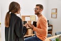 Two caucasian business executives talking and drinking coffee at the office Royalty Free Stock Photo