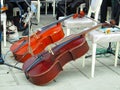 Two Cello Bow Instrument in orchestra on stage Royalty Free Stock Photo