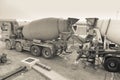 Two cement mixers on construction site