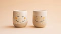 Two Ceramic Mugs with Smiley Faces Royalty Free Stock Photo
