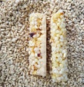 two cereal bars covered with wheat seeds Royalty Free Stock Photo