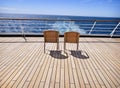 Two Empty  Chairs on Deck Royalty Free Stock Photo