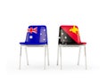 Two chairs with flags of Australia and papua new guinea