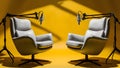 Two chairs and microphones in podcast or interview room isolated on solid yellow background Royalty Free Stock Photo