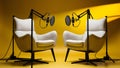 Two chairs and microphones in podcast or interview room isolated on solid yellow background Royalty Free Stock Photo