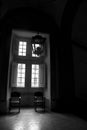 Two chairs next to window of the Palace-Convent of Mafra