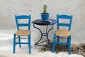 Two chairs outside a Greek restaurant Royalty Free Stock Photo