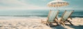 two chairs sit on the beach and have umbrellas on the top Royalty Free Stock Photo