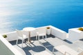 Two chairs with table on the terrace overlooking the sea. Royalty Free Stock Photo