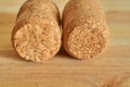 Two champagne corks on a wooden table. Close up Royalty Free Stock Photo