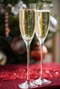 Two Champagne Flutes on Christmas Background Royalty Free Stock Photo