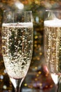 Two Champagne Flutes on Christmas Background Royalty Free Stock Photo