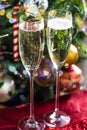 Two Champagne Flutes on Christmas Background Royalty Free Stock Photo