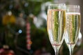 Two Champagne Flutes on Christmas Background Royalty Free Stock Photo