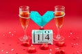 Two champagne glases, candy and medical mask valentine