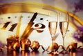 two champagne glasses against holiday lights and fireworks - new year celebration Royalty Free Stock Photo