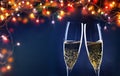 two champagne glasses ready to bring in the New Year - holiday lights and fireworks in the background Royalty Free Stock Photo