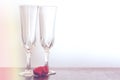 Two champagne glasses and two chocolate heart candies with copy space and vintage effect Royalty Free Stock Photo