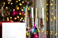 Two champagner glasses on glass table with bokeh background Royalty Free Stock Photo