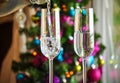 Two champagner glasses on glass table with bokeh background Royalty Free Stock Photo