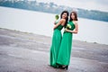 Two charmed girls bridesmaids on green dress