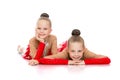 Two charming girls beautiful gymnasts in sports