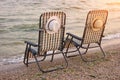 Two checkered beach chairs. Royalty Free Stock Photo