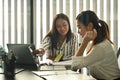 Two businesswomen working on new project together in office. Royalty Free Stock Photo