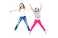 Two cheerful girls in a jump