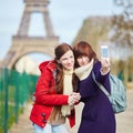 Two cheerful girls in Paris doing selfie Royalty Free Stock Photo