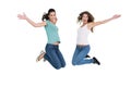 Two cheerful young female friends jumping Royalty Free Stock Photo