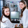 Two chemistry students carrying out experiments in a lab Royalty Free Stock Photo