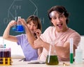 Two chemists students in classroom Royalty Free Stock Photo