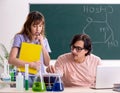 Two chemists students in classroom Royalty Free Stock Photo