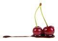 Two cherries in chocolate on white background Royalty Free Stock Photo