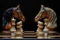 Two chess knights face each other in a tense moment on the chessboard Royalty Free Stock Photo